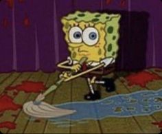 spongebob is cleaning the floor with a mop