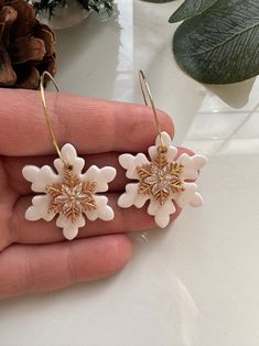 Gorgeous snowflake earrings featuring gold plated snowflake with cz jewels, subtle shimmer on white polymer clay.  The perfect versatile winter earring! White Polymer Clay, Winter Earrings, Flower Mound, Snowflake Earrings, Bow Earrings, Earring Patterns, Cute Earrings, Jewelry Earrings Dangle, Dangle Drop Earrings