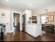 the kitchen is clean and ready to be used as a dining room or family room