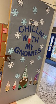 a bulletin board that says chillin with my gnomies on the front door