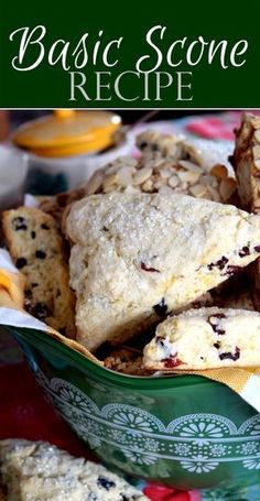 some scones are in a green bowl on a table