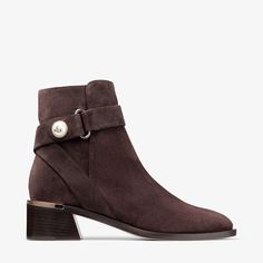 The Noor boot is a timeless silhouette crafted from velvet suede. This sleek design features a strap adorned with a Jimmy Choo pearl. Coffee Outfits, Coffee Outfit, Shoes Luxury, Sneaker Dress Shoes, Jimmy Choo Shoes, Footwear Design Women, Sneaker Wedge, Designer Boots, Suede Ankle Boots