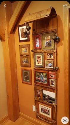 a wooden shelf with many pictures on it