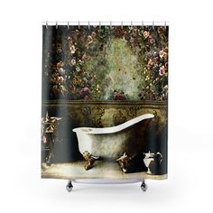 a bath tub sitting in front of a wall with flowers on it