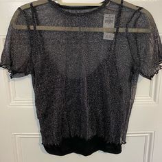 Hollister Mesh Baby Tee With Build In Tank Top Never Been Worn, New With Tags Fit Is Small Since It Is A Baby Tee, For That Reason I Would Say It Mostly Fits True To Size/ Closer To A Large Shimmer Stretch Tops For Night Out, Black Crew Neck Top For Party, Trendy Short Sleeve Mesh Top For Party, Fitted Silver T-shirt With Short Sleeves, Metallic Fitted Crew Neck Top, Silver Crew Neck Top For Party, Summer Shimmer Tops For Night Out, Summer Shimmer Top For Night Out, Summer Night Out Shimmer Tops