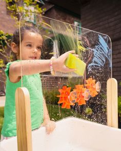 Scoop and spray and learn and play! This sensory play table comes ready for all kinds of splashy, sandy, creative fun. Kids can create custom water features with the pipe set, explore art with the paint crayons, or dig into a sand bin. Adjust the height from toddler to big kid to keep the play going year after year! Montessori Water Play, Water Play For Babies, Water Play For One Year Old, Reggio Water Provocation, Nature Play Ideas, Outdoor Sensory Play, Water Play Table, Big Kid Water Table, Bamboo Water Play