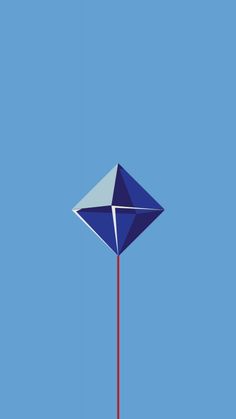 a blue kite flying in the sky with a red string attached to it's end