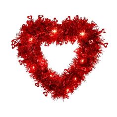 a red heart shaped garland with lights on it