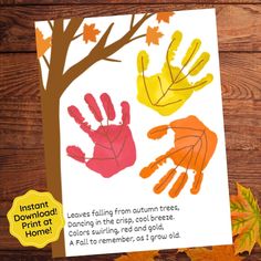 an autumn card with handprints and leaves on it