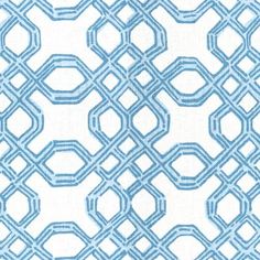 an abstract blue and white pattern on fabric