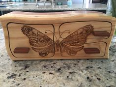 Solid Wood Box W/Drawers - Butterfly, Jewelry Box, Handcrafted, Custom Box, Personalized Box, Handmade, Box, Home Decor, Engraved, Stash Box Size (approx) 12" long x 5" deep x 5" tall. The ideal gift for the person with everything! Affordable, durable heirloom quality every time. Each of our bandsaw boxes begins life the same way, a solid block of wood made from layers of Pine and Cedar with Poplar as the engraved layer (if applicable). We hand sand and top coat each box to ensure a superior qua Butterfly Jewelry Box, Bandsaw Boxes, Bandsaw Box, Stash Box, Box Handmade, Handmade Box, Butterfly Jewelry, Wood Box, Personalised Box