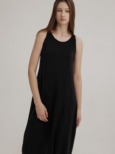 This is a trendy and minimal dress by AVA MOLLI that is made out of high quality and sturdy material. With distinctive mood of the design and feminine look, you can style it for your trendy and refined daily outfit.- Color point on the neckline and armhole- High density fabric with subtle gloss- Classic look that goes with various styling Sleek Black A-line Sleeveless Dress, Sleek Midi Dress For Daywear, Chic Black Sleeveless Dress For Daywear, Modern Black Midi Dress For Daywear, Sleek Black Viscose Midi Dress, Modern Black Maxi Dress For Work, Sleek Black Knee-length Sleeveless Dress, Chic Black Viscose Midi Dress, Minimalist Sleeveless Daywear Dress