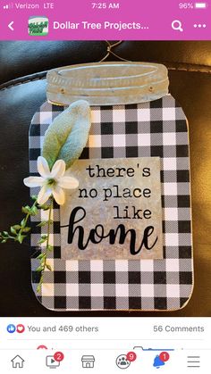 a mason jar with a flower on it that says, there's no place like home