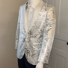 White Satin Lapels Adorn The Front Of This Camo Print Jacket In Silver Lame’. Be The Hit Of The Next Party! Mens Suit Jacket, Men’s Suits, Print Jacket, White Satin, Camo Print, Sport Coat, Mens Suits, Blazer Suit, Camo