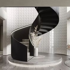 a black spiral staircase in a modern home