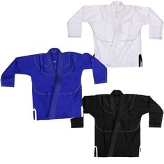 three different colors of karate uniforms on white, black, and blue ones are shown