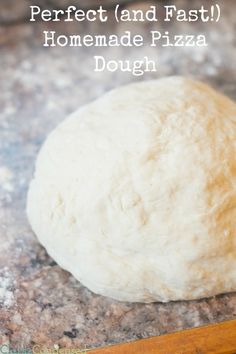 a ball of bread sitting on top of a counter