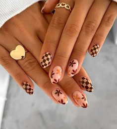 Fall has come, which means it's time for you to upgrade your short nails to one of these cute short fall nails. As a nail lover, I can't miss out a season without getting a fresh nail set and I bet it's the same for you. Thus we've got you everything from short fall nails,  cute fall short nails, fall short nail ideas, fall short nail inspo, short fall nail colors, short fall nail ideas, autumn short nails and so much more to enjoy this fall with a new mani. Brown Skin Nail Art, Brown Retro Nails, Nail Ideas For Teachers, Nail Art Brown Skin, Fun Almond Nail Designs, Neutral Design Nails, Gaming Nails, Pretty Brown Nails, Trendy Brown Nails