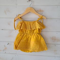 Baby Girl Solid Lace Design Hollow Strappy Sleeveless Romper Spring Sleeveless Bubble Romper For Playwear, Playful Sleeveless Bubble Romper For Playdate, Sleeveless Ruffle Bubble Romper For Playdate, Playful Tank Top For Spring Playtime, Sleeveless Summer Bubble Romper With Ruffles, Cute Yellow Sleeveless Top, Sleeveless Ruffled Bubble Romper For Playwear, Sleeveless Cotton Bubble Romper With Ruffles, Playful Tank Top For Beach