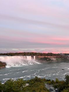 the niagara falls at sunset as seen from across the river