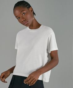 The Classic Jersey Short Sleeve Boy Tee is done in a luxe cotton jersey. It combines the weight and shape of a men's piece with the fit of a women's tee. It features a slightly cropped, boxy shape with longer and wider cut sleeves. Effortless Boxy Crew Neck Top, Modern Cropped Top For Everyday Wear, Everyday Boxy Fit Tops With Shirttail Hem, Boxy Fit Tops With Shirttail Hem For Everyday, Minimalist Boxy Fit Crew Neck Top, Classic Cropped Relaxed Fit Tops, Short Pj Set, Black Camis, Boy Tees