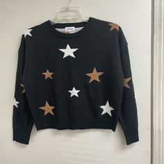 Black Star Sweater Size Medium Casual Fall Sweater With Star Print, Black Star Print Top For Winter, Trendy Black Sweater With Star Print, Black Star Print Top For Spring, Black Star Print Tops For Spring, Black Tops With Star Print For Spring, Black Casual Sweater With Star Print, Casual Black Sweater With Star Print, Casual Black Star Print Sweater