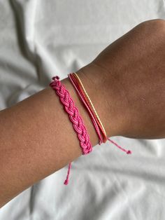 This bracelet stack is an easy way to add flair to your wrists.  Pair them with your favorite bracelets, wear them solo, or even as an anklets.  The fully adjustable, secure fit promises carefree wear.  If you would like a certain color for your bracelet let me know! (Ex: Light pink, dark pink, tan, periwinkle)  Feel free to send a message if there is any changes you would like made to your bracelet. (Ex: length, size)  Enjoy your jewelry! Drawstring Bracelets, Braid Bracelet, Bracelet Cordon, Pura Vida Bracelets, String Bracelet, Braided Bracelets, Bracelet Stack, Dark Pink, Friendship Bracelets