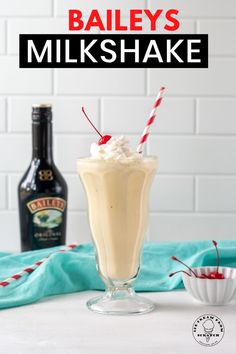 bailey's milkshake in a tall glass with whipped cream on top