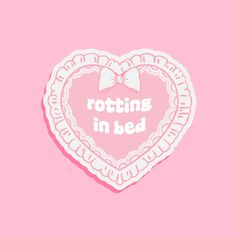 a heart shaped sticker with the words rotting in bed