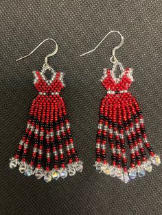 Earring are made with red, black and clear crystal seed beads, plus a Swarovski crystal bicone is placed at the end of each of the 9 dangles. The earrings measure approximately 2.5 inches in length by 1 inch width. Red Beaded Earrings With Black Round Beads, Red Beaded Fringe Earrings, Red Dress Earrings, Beaded Red Dress, Red Beaded Dress, Dress Earrings, Native Beadwork, Wedding Jewelry Earrings, Pink Earrings