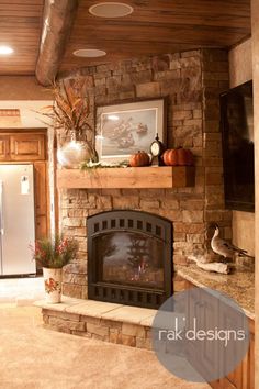 a living room with a fire place and a television mounted on the wall above it