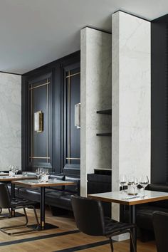 an elegant restaurant with black and white decor