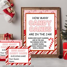 candy canes are in the jar and on display next to christmas decorations, stockings and gifts