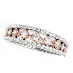 a diamond ring with two rows of diamonds on it's sides, set in 18k white and rose gold