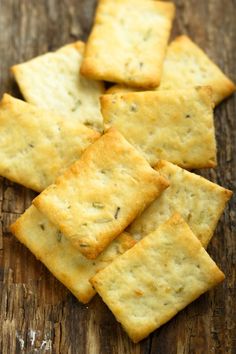 crackers are sitting on a wooden table