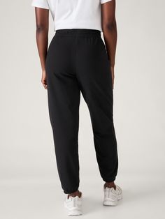 FOR: Commuting, work, and travel FEEL: Breathable cotton with a soft, terry cloth interior FAVE: Easy-access pockets to stash your essentials Semi-fitted, skims easily over the body Mid rise, sits below the natural waist Jogger has loose fit and tapered bottom Size down for a slimmer fit. Black Everyday Activewear With Side Pockets, Everyday Black Activewear With Side Pockets, Cotton Workout Sweatpants With Side Pockets, Black Activewear With Pockets For Everyday Use, Cotton Activewear With Side Pockets, Comfortable Black Activewear With Side Pockets, Basic Cotton Activewear With Comfort Waistband, Basic Relaxed Fit Activewear With Pockets, Comfortable Everyday Activewear With Pockets