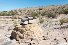 rocks stacked on top of each other in the desert