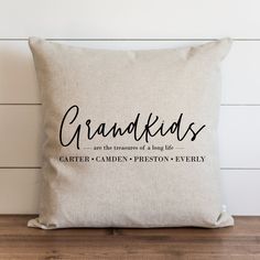 a pillow with the words grandkids printed on it