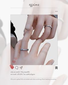 two hands with wedding rings on their fingers