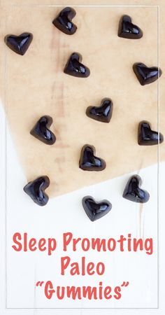 there are many black hearts on top of the sign that says sleep promoting paleo gummies