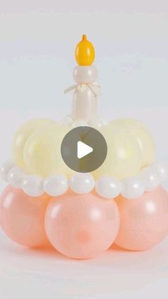 an image of a baby shower toy with bubbles on the bottom and a video play button