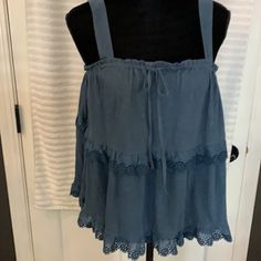 Nwt Beautiful Anthropologie Navy Camisole Top With Ruffled Details. 15” Pit To Hem 16” Pit To Pit. (125) Casual Tops With Lace Trim And Ruffled Straps, Blue Summer Tank Top With Tie Straps, Casual Blue Ruffled Tank Top, Summer Blue Tank Top With Tie Straps, Blue Tank Top With Tie Straps For Summer, Blue Ruffled Cami Tank Top, Blue Ruffled Sleeveless Camisole, Blue Ruffled Straps Tank Top, Casual Cami Blouse With Ruffles