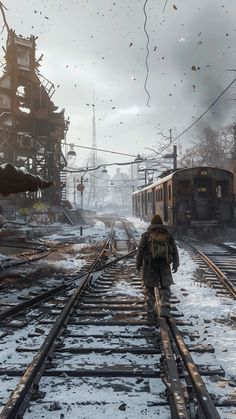 a man walking on train tracks in the snow next to an abandoned building and railroad tracks