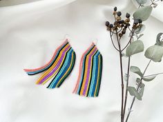 "These are multicolored nature beaded earrings made with inspiration taken at Rainbow Mountain in Peru. It also makes an excellent gift for birthdays, anniversaries, mother's day, valentine's day, Bridesmaid gift, and more. ♡ Total Length - 4.5'' (11,4 cm)/3.5\" (9 cm)/2.1'' (5,5 cm) ♡ Quality Czech beads If you like these colorful seed bead earrings but would like them in a different color or size please email me and I do a special custom order. I accept payments through Paypal. The colors can Colorful Handmade Beaded Earrings As Gift, Colorful Handmade Beaded Earrings For Gift, Multicolor Tiny Beads Earrings For Gift, Rainbow Colored Beaded Drop Earrings For Gift, Rainbow Beaded Drop Earrings For Gift, Multicolor Handwoven Earrings Gift, Multicolor Handwoven Beaded Drop Earrings, Multicolor Handwoven Earrings For Gift, Colorful Dangling Beaded Earrings As A Gift