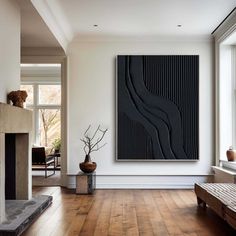 a living room filled with furniture and a painting on the wall above a fire place