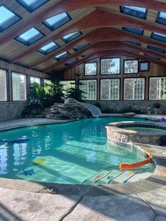 Large Indoor Swimming Pool, Indoor Pool Landscaping, Swimming Pool With Lap Lane, Indoor Pool Ideas Dream Homes Luxury, Pools Inside Houses, Backyard Indoor Pool, Pretty Pools Dream Homes, Indoor Pool And Hot Tub