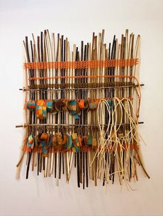 there is a wall hanging made out of sticks