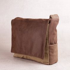 "Camel Brown Large Vegan Messenger Bag, Durable Canvas Laptop Bags, Crossbody / Shoulder Bag for Men, Gift for Him A classic unisex messenger bag, made from a mix of fabrics, textures, and colors that create a wide variety of unique pieces available. This bag perfect for university and college students, as well as for work. It is large and convenient to accommodate large laptops, books, and folders (and your lunch too...). You can Customize this bag in any color you wish! write to us about which Leather Laptop Bag For Men, Bike Messenger Bags, Mens Messenger Bag, Canvas Laptop Bag, Shoulder Bag For Men, Mens Valentines Gifts, Ipad Bag, Large Crossbody Bags, Mens Travel Bag