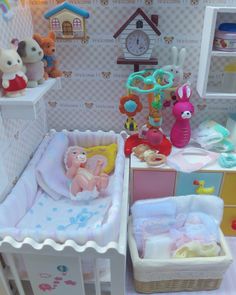 there are many stuffed animals and toys in this toy room, including a crib