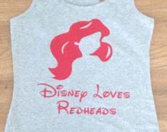 a women's tank top with the words disney loves redheads printed on it